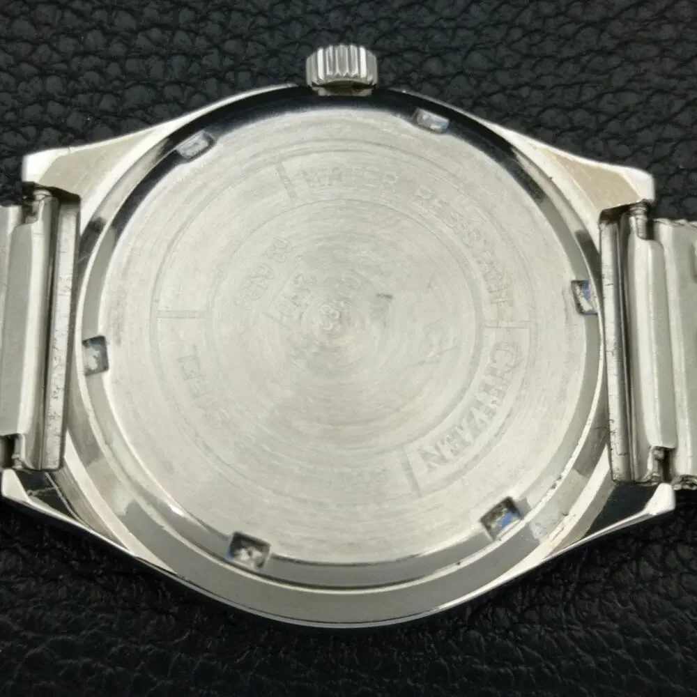 Vintage 1988 Citizen Manual Mens Silver Watch W/daydate & White accents
